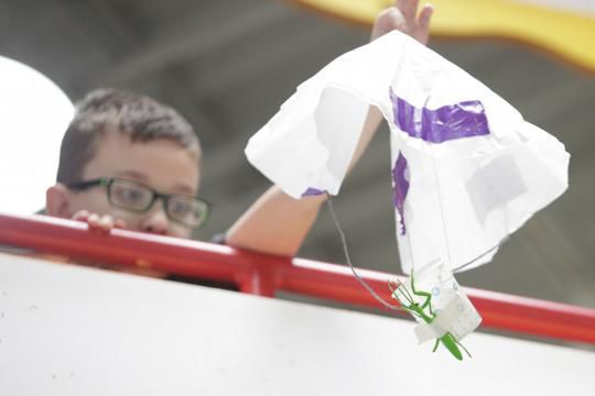 Parachutes fly in the Children's Museum of Illinois for the Lunar Landing STEAM program